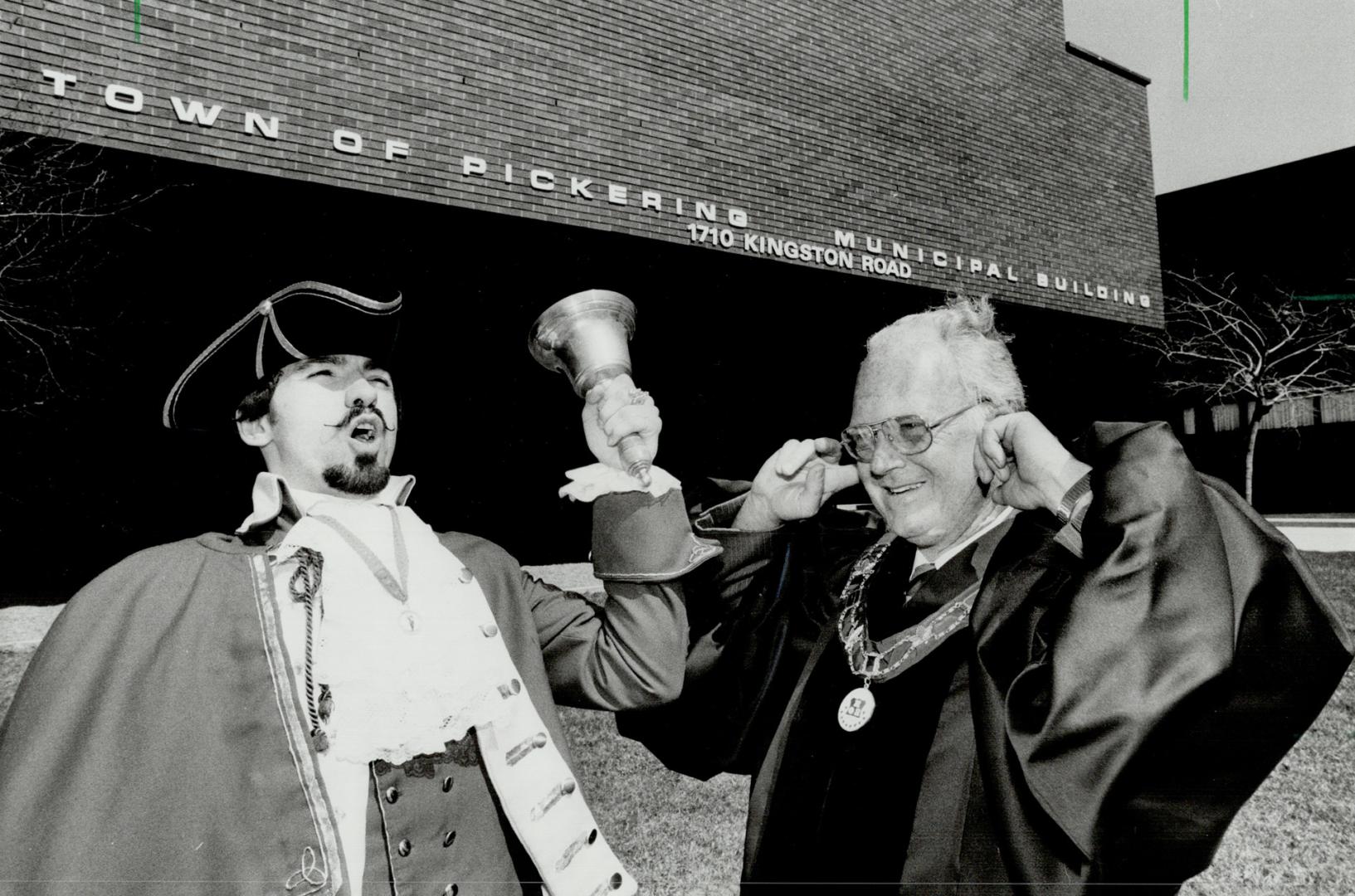 Hear ye, hear ye: Town Crier Daniel Richer Dit La Fleche's bell is really music to the ears of Pickering Mayor Jack Anderson, if a trifle loud.