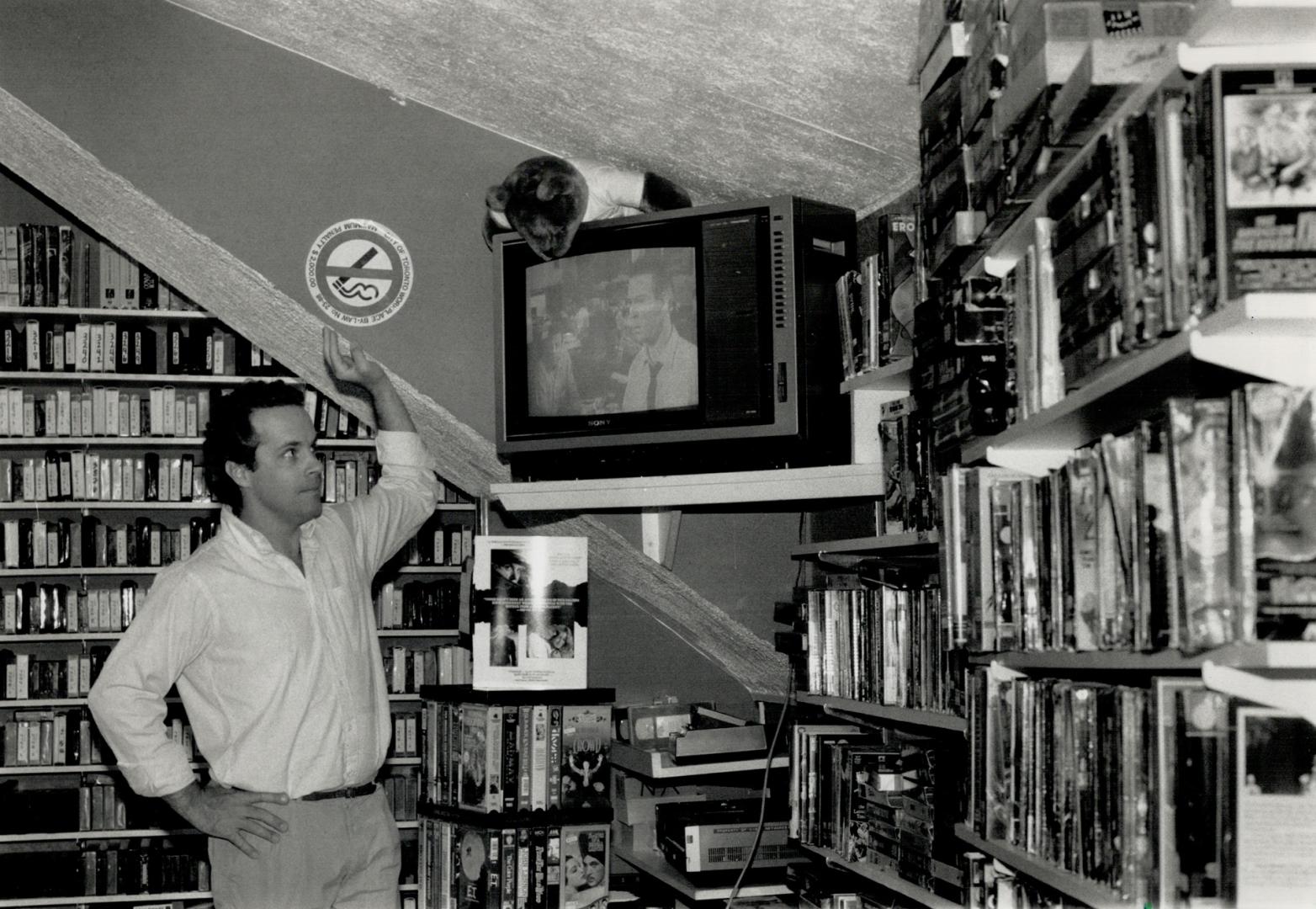 Cramped quarters, Ian Richardson of Video Networks watches Whatever Happened To Baby Jane? at his Church St