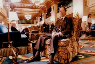 In the lobby of the Royal York Hotel, Ron Robins takes time to recharge his energy through transcendental meditation.