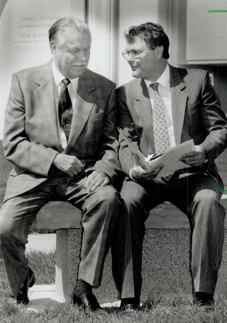 Officials: Left, Arnold Roberts, president of the Church of Jesus Christ of Latter-day Saints in Brampton and, right, Dick Robertson, director of public communications