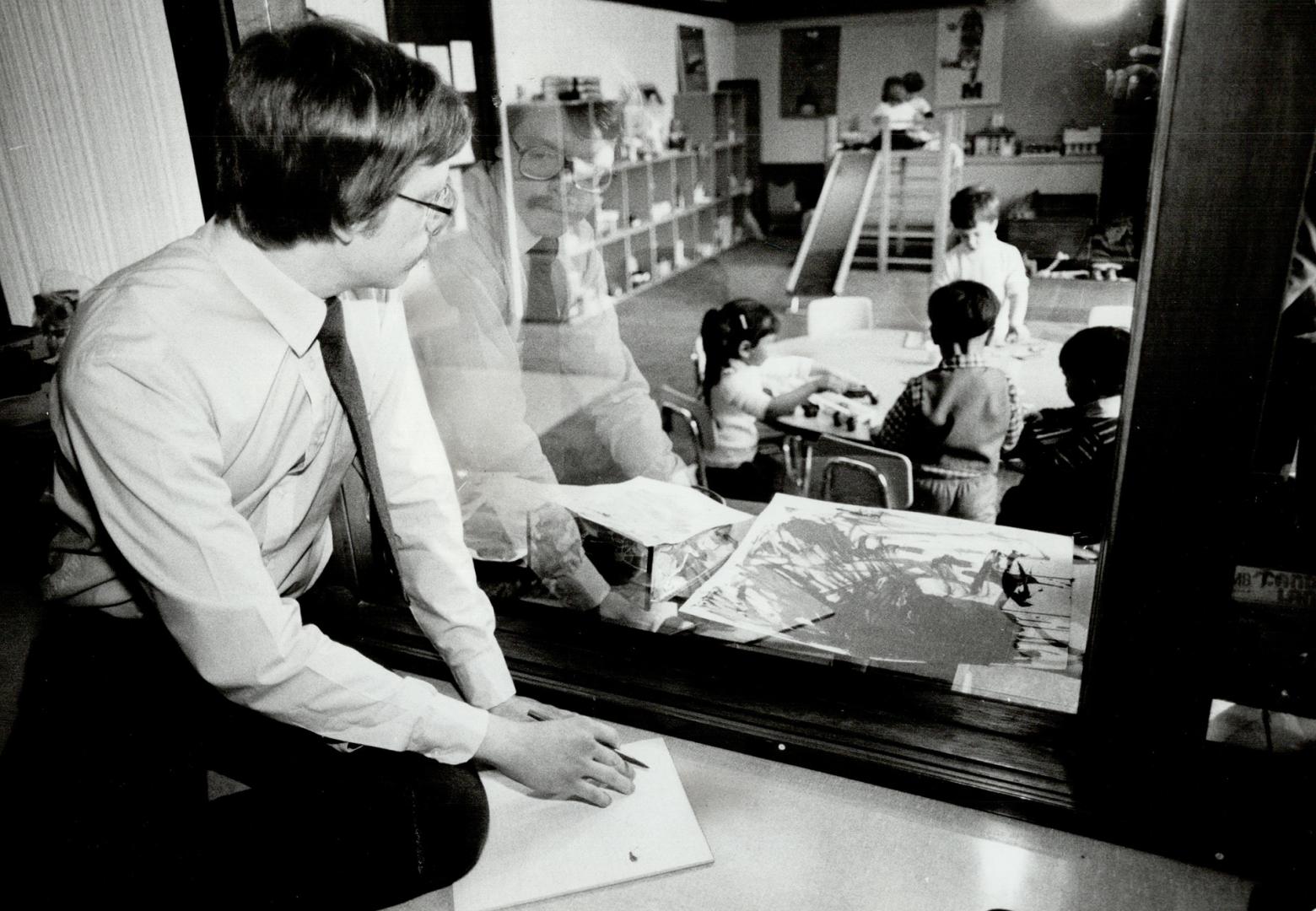 The jury: Children aged 2 1/2 to 5 enrolled in the Fisher-Price nursery school are given toys being designed by the company to play with under the supervision of a teacher such as Kathleen Alfano, above left