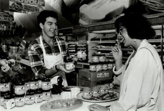 Mustard maker: Stephen Sandler distributes samples of his mustards during a supermarket promotion.