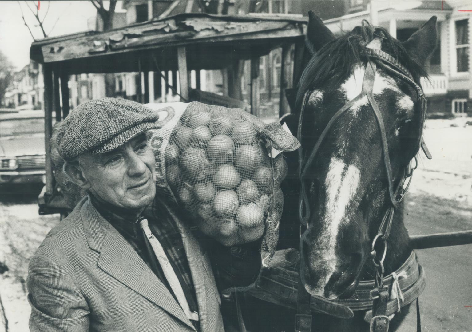 At 65 Sam Sewdlaz can still heave 75-po und bags of produce over his shoulder