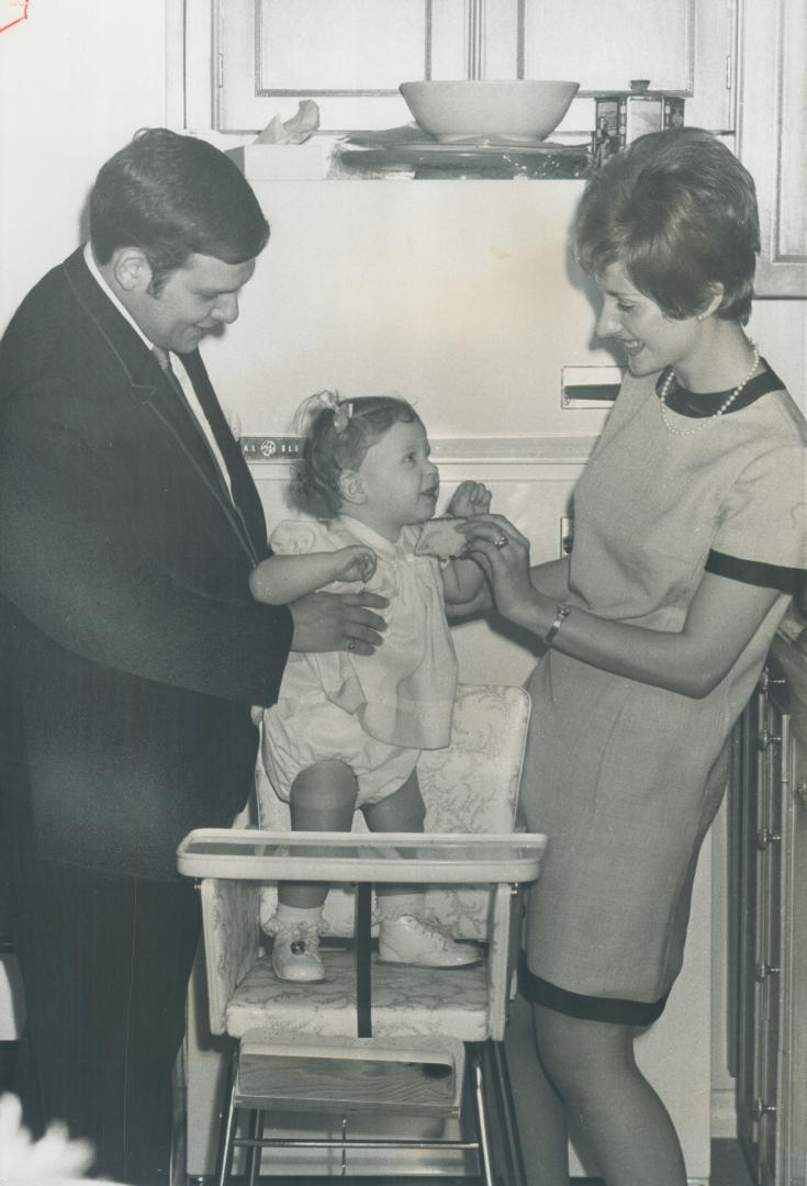 Cantor Paul Sheldon with his wife and daughter Karyn. Sheldon, 27, cantor at Beth EI Synagogue, studied music in New York, Chicago