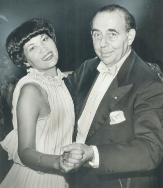 Coral Ko dances with guest of honor, Italian Ambassador Giogio Smoquina, at the ball