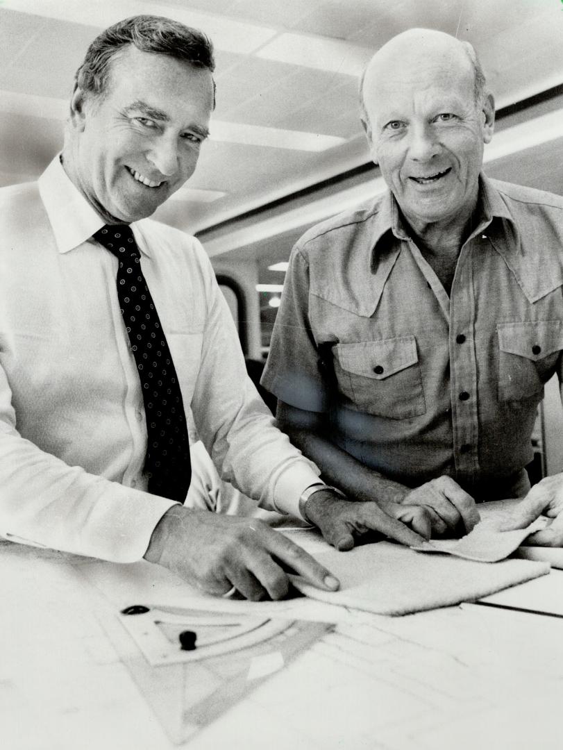 Sound advice: Going over the plans for New Massey Hall are Ted Schultz (right) of Bolt, Beranek and Newman, acoustical designers, and Douglas Haldenby of Mathers and Haldenby, site architects