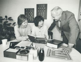 Special help: Mary Louise Steinberg, left, and her husband Abner help Ruth Iverson learn to read