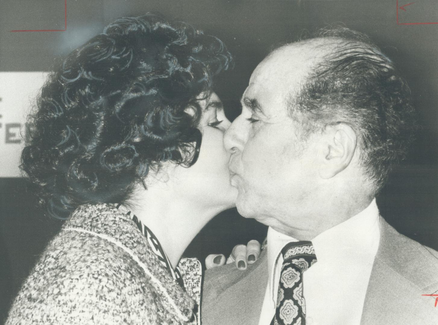 Candidates for the Liberal nomination in Scarborough Centre riding, John Tsopelas and Sylvane Walters kiss before voting starts