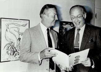 Stock takes stock: Canada Packers president Valentine Stock (left) compares notes with new director George Richardson at the company's annual meeting, held this year at the Art Gallery of Ontario