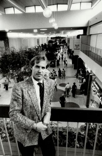 Young dynamo: Russell Tanz looks over Towne and Countrye Square, which he has managed for 4 1/2 years