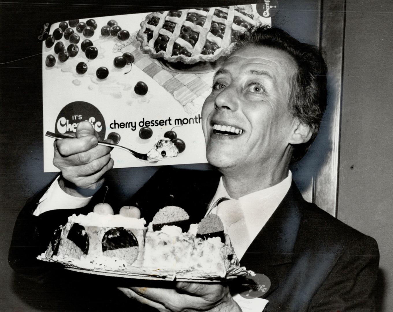 Cherry delight: patissier George Tenthorey gleefully holds his masterpiece - $500 frozen cream cake with kirsch and sour cherries.