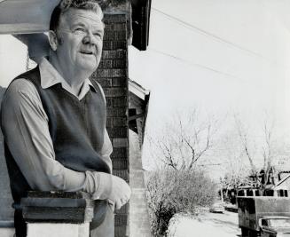 His living-room is right in the way of the proposed Scarborough Expressway. Fred Thompson, 28 Highcroft Rd., doesn't want the road built.