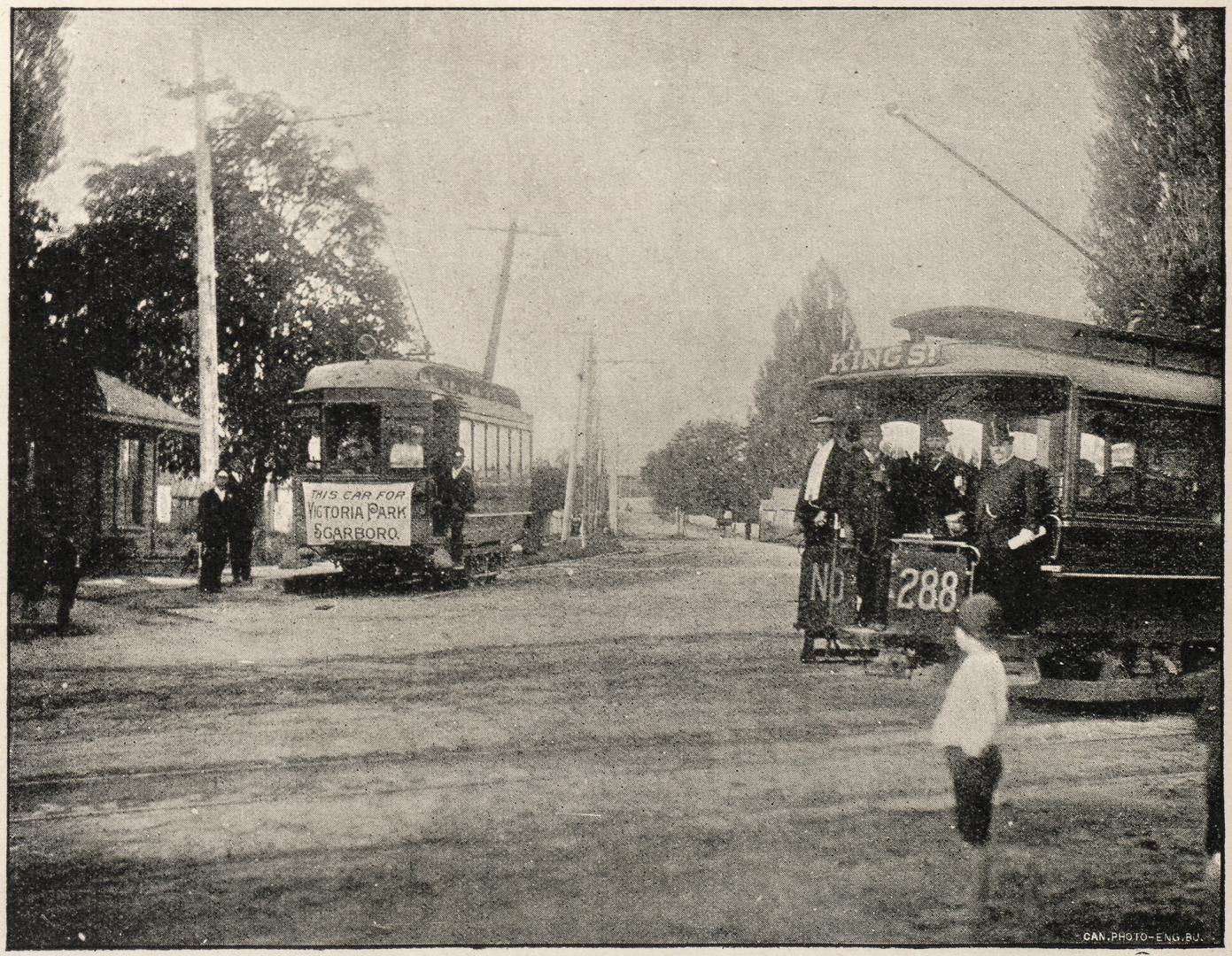 Kingston Road, looking north from Queen Street East, opposite Woodbine Park race track, at the junction of the Toronto Railway Company's King Street line on Queen Street East and the Toronto & Scarboro Railway's line on Kingston Road, Toronto, Ont.