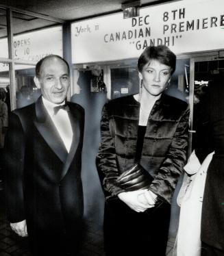 Gandhi in metro: Ben Kingsley, who starts in the title role of the film Gandhi, and his wife ALison stand beneath the marquee at the York Theatre yesterday afternoon before a special premiere of the epic movie