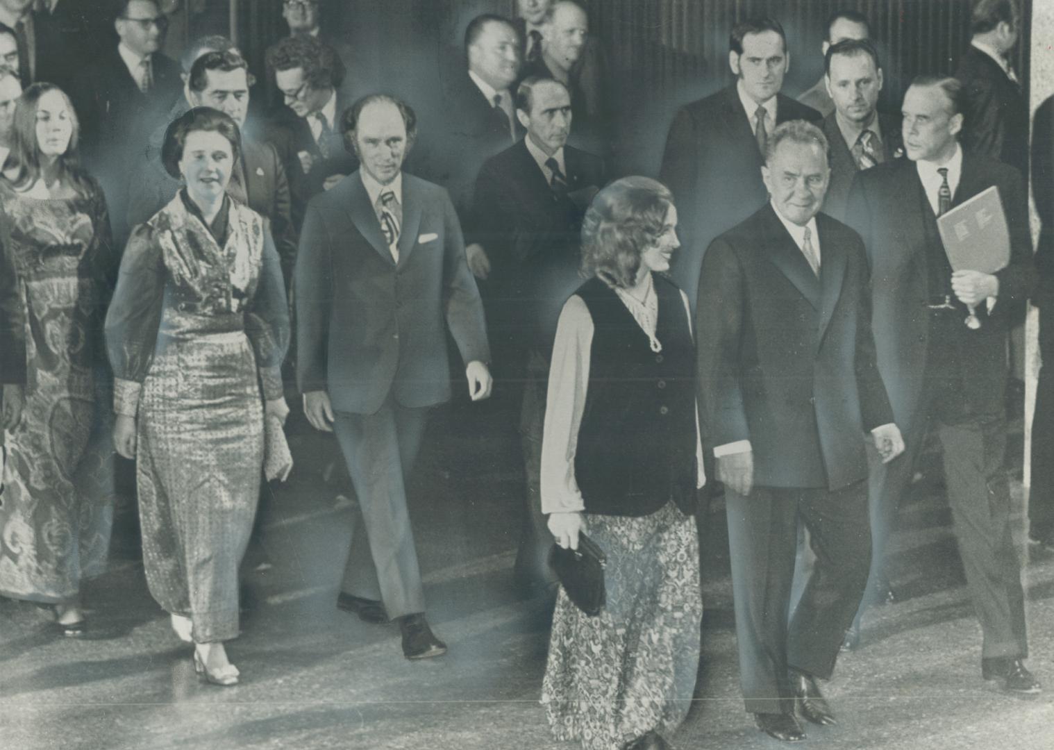 Arriving at gala concert held in his honor at Ottawa's National Arts Centre last night, Soviet Premier Alexei Kosygin walks beside Mrs