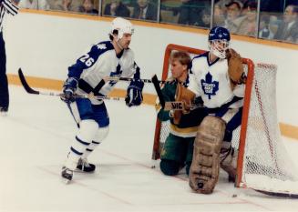 Crowded goalmouth: North Stars' Willi Plett crashes into net as Leafs Chris Kotsopoulos and goal tender Ken Wregget keep eyes on the action in corner during action last night at the Gardens