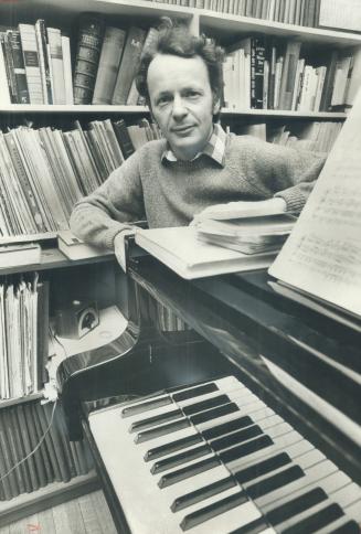 Anton Kuerti relaxes at home near a grand piano like the one he has dismantled and moved by truck to concerts within 1,000 miles of home