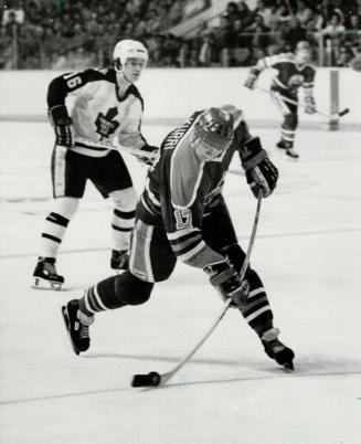 Power: Jari Kurri gets everything into his slapshot, which beat Leafs' Jim Rutherford in third period last night