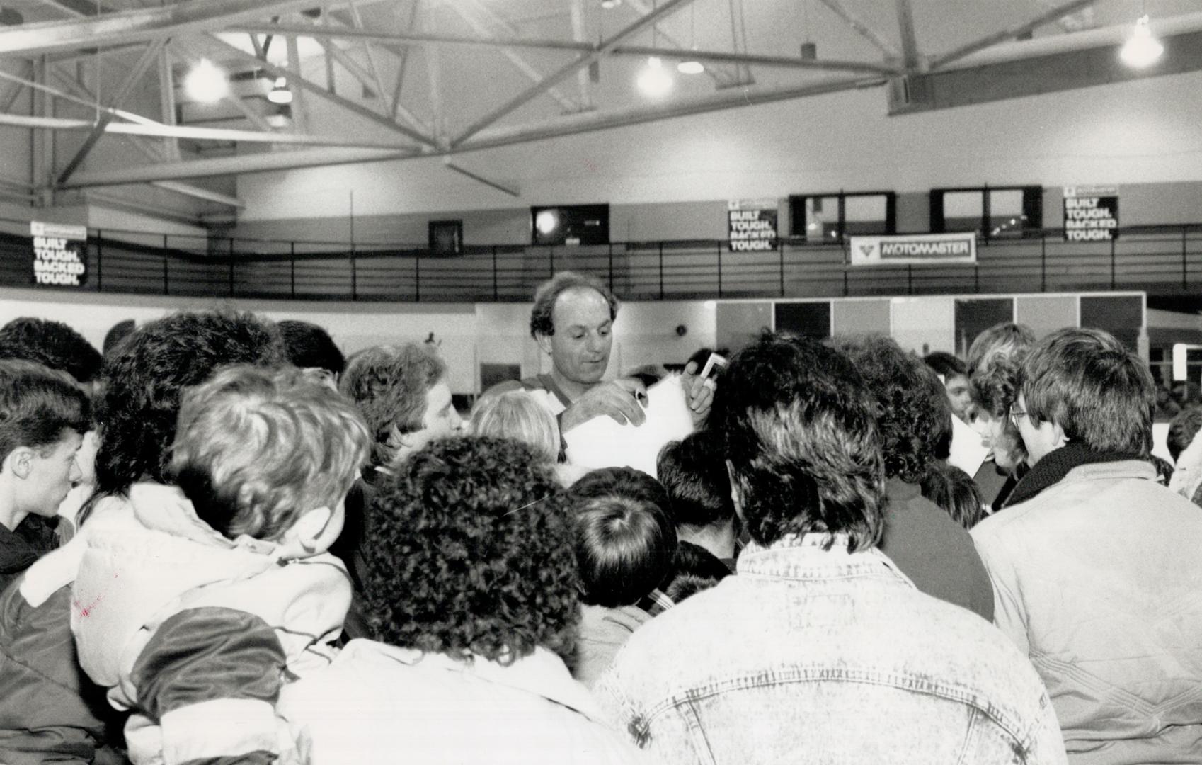 Guy Lafleur's popularity stretches far beyond the Forum. The Flower was mobbed by autograph seekers yesterday at North York