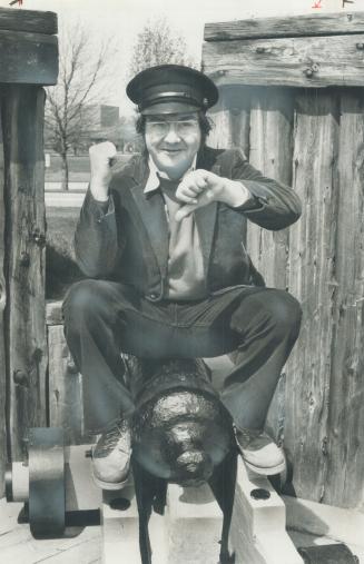 All set to blast this season's Shaw Festival audiences with laughter, actor Heath Lamberts sits atop a cannon in Niagara-on-the-Lake where he'll be performing in Devil's Disciple and Too True to Be Good