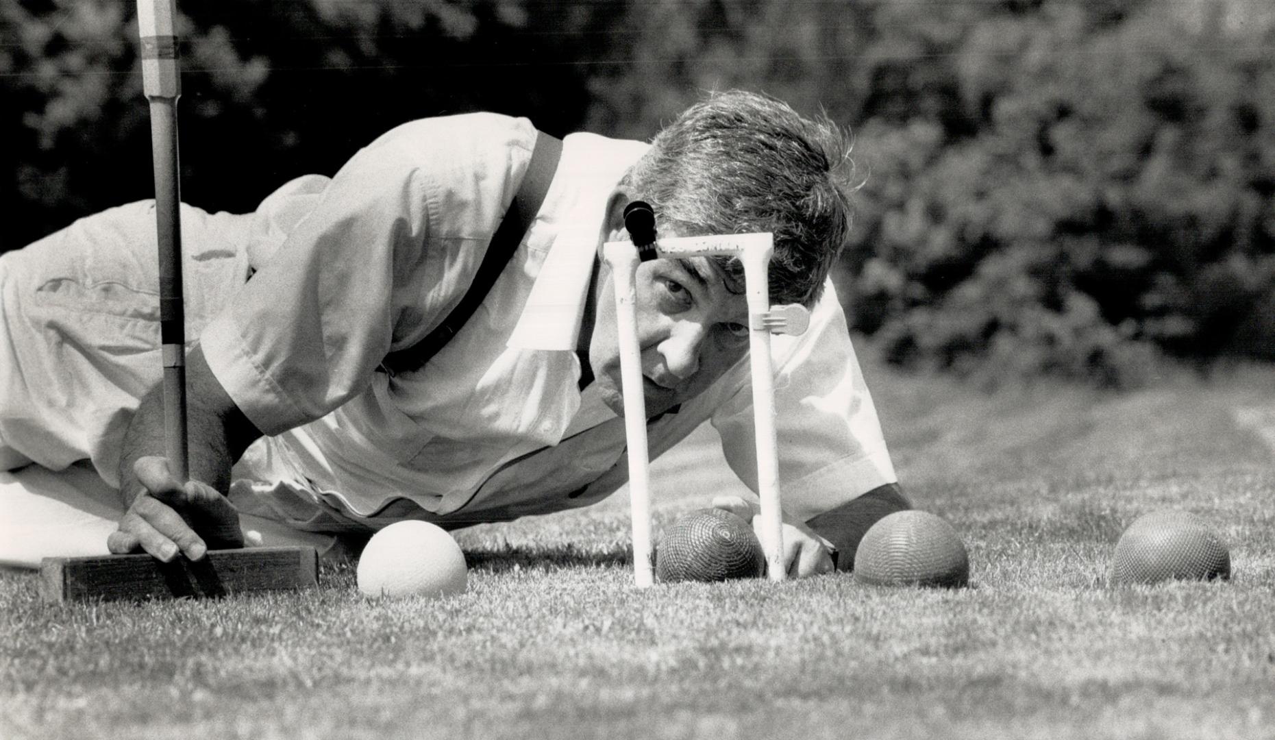 Sticky wicket: William Langstroth, president of Croquet Canada, lines up a shot