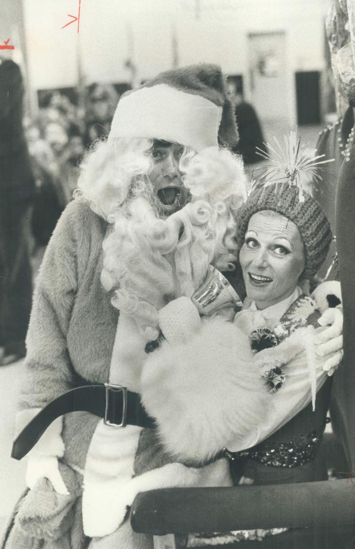 . . . and adults, North York Mayor Mel Lastman played Santa for yesterday's children's party and had some help from his wife, Marilyn, who looked more like a Christmas tree than Mrs. Claus.