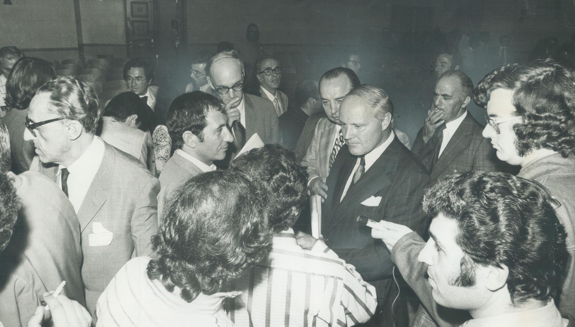 Justice Secretary Allan Lawrence is shown speaking to a meeting of members of various Italian communities at the Oakwood Collegiate auditorium yesterday