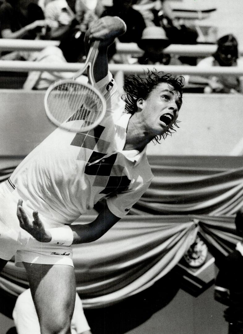 Eye on the ball: Ivan Lendl of Czechoslovakia, defending champion in the Canadian Open, unleashes a powerful serve in his match against Andrew Pattison yesterday