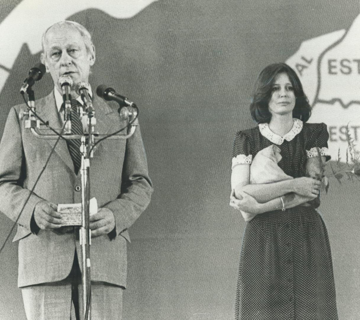 The agony of defeat: Quebec Premier Rene Levesque, his wife Corinne at his side, delivers a tearful speech to a crowd of 6,000 suppoters at Montreal's Paul Sauve arena