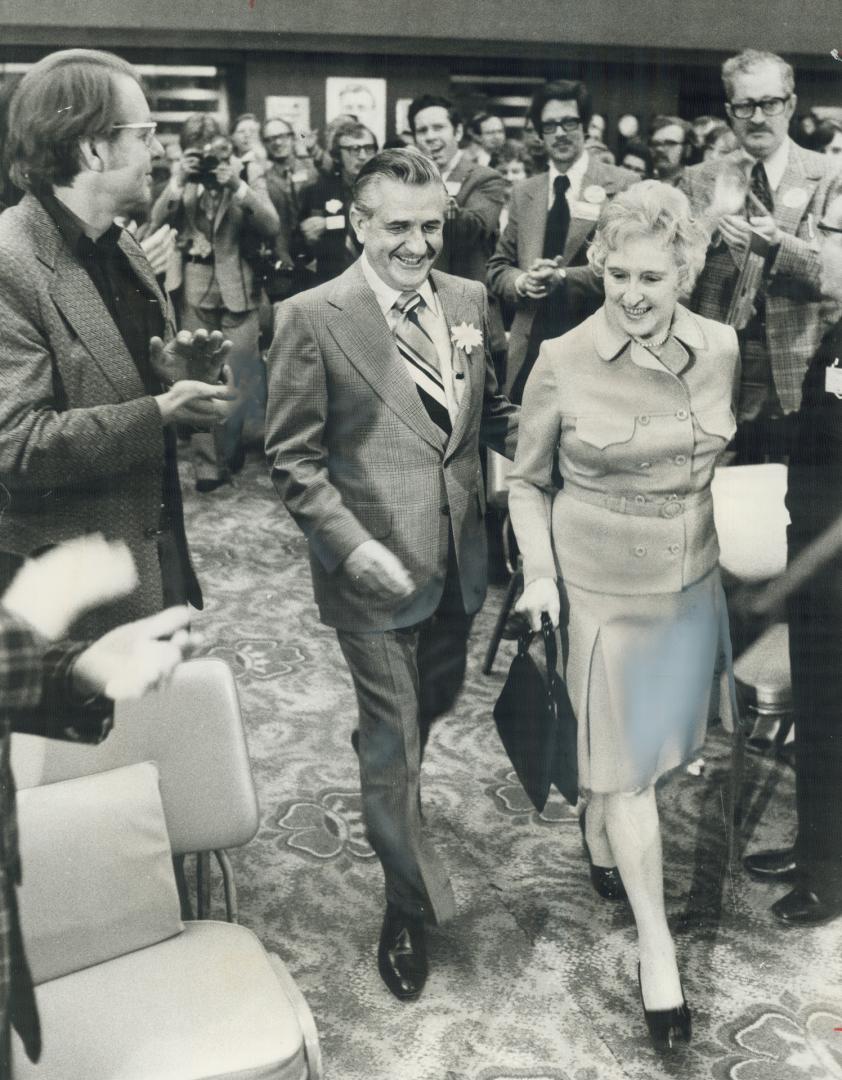 NDP leader David Lewis enters a room in the Royal York Hotel, with his wife, Sophie, where he officially opened his election campaign yesterday