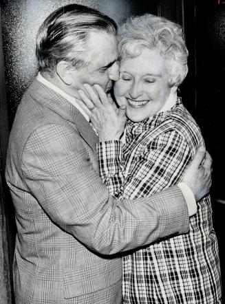 Sophie Lewis and husband NDP Leader David Lewis share an exciting moment of triumph during one of their campaign appearances