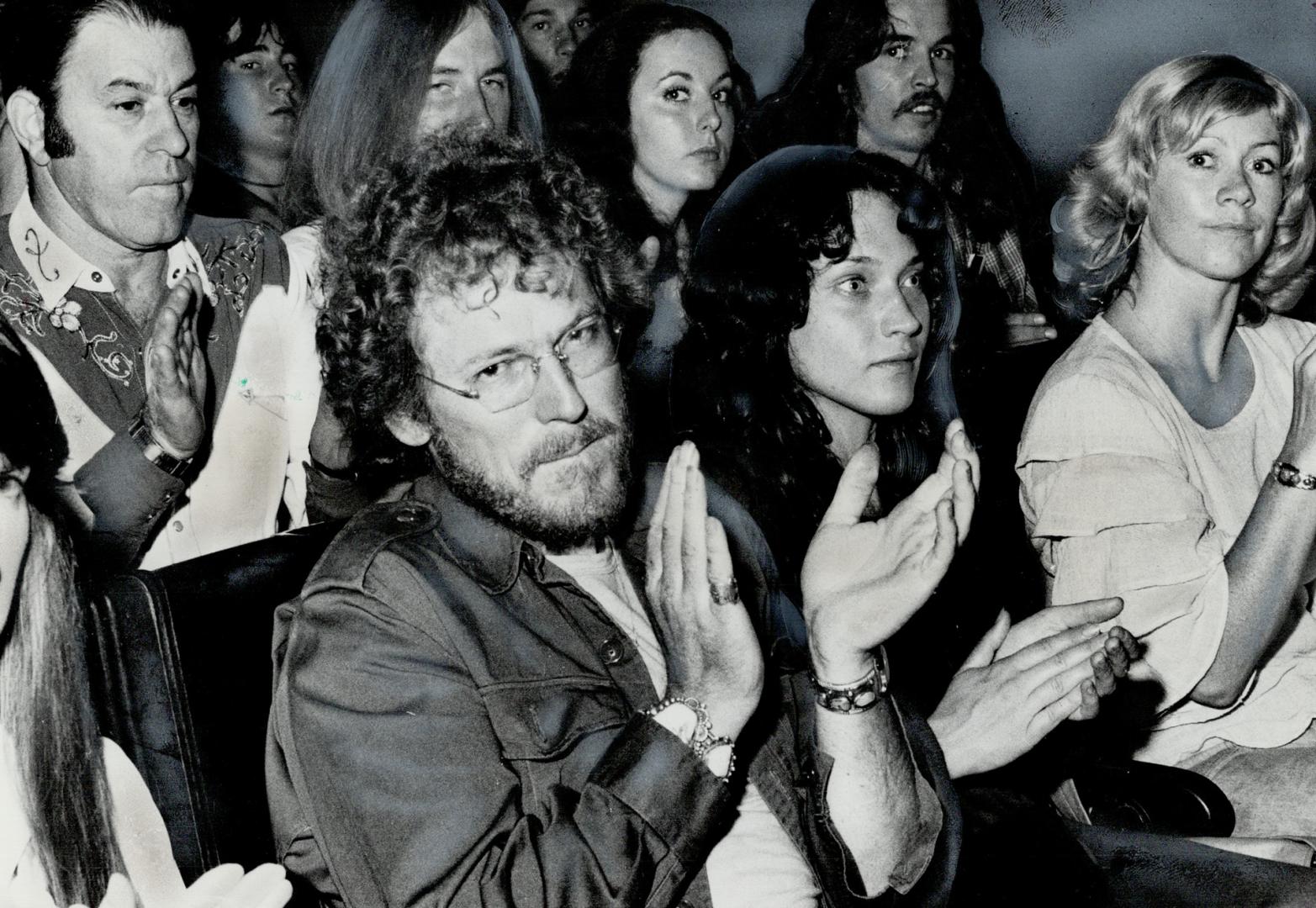 A man who's usually up on the stage rather than sitting in the front row, folksinger Gordon Lightfoot (with glasses) dropped in on his friends The Good Brothers, from Richmond Hill, at concert in University of Toronto's Convocation Hall Friday night