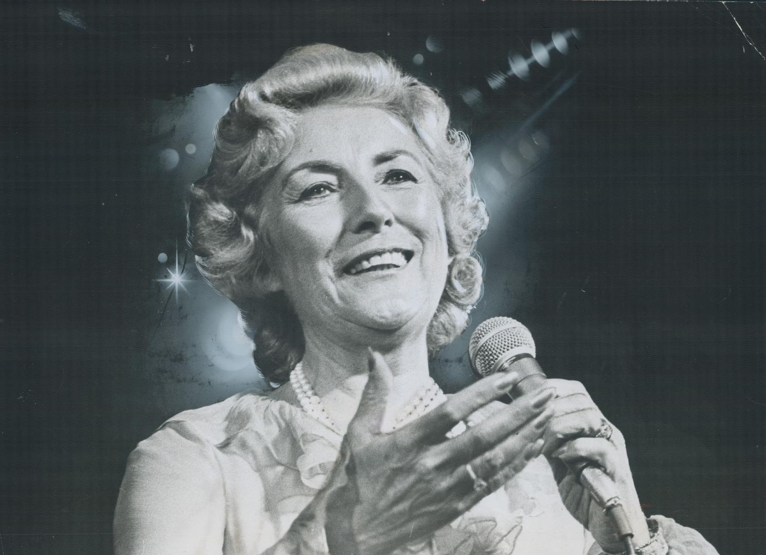 Dame Vera Lynn, morale booster of Allied servicemen during World War II, brought the memories flooding back to 17,000 sentimental souls at her concert in the CNE Grandstand last night