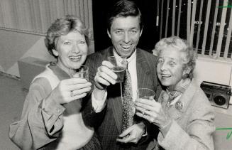 Delayed toast: Tory David MacDonald, with wife Sandra, left, and mother Helen celebrates results of recount that made him official winner in Rosedale riding