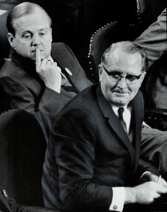 Leadership opponents at the recent Ontario New Democratic Party convention in Kitchener, James Renwick (left), who lost in his bid for leadership, sits in Legislature beside man who retained post, Donald MacDonald