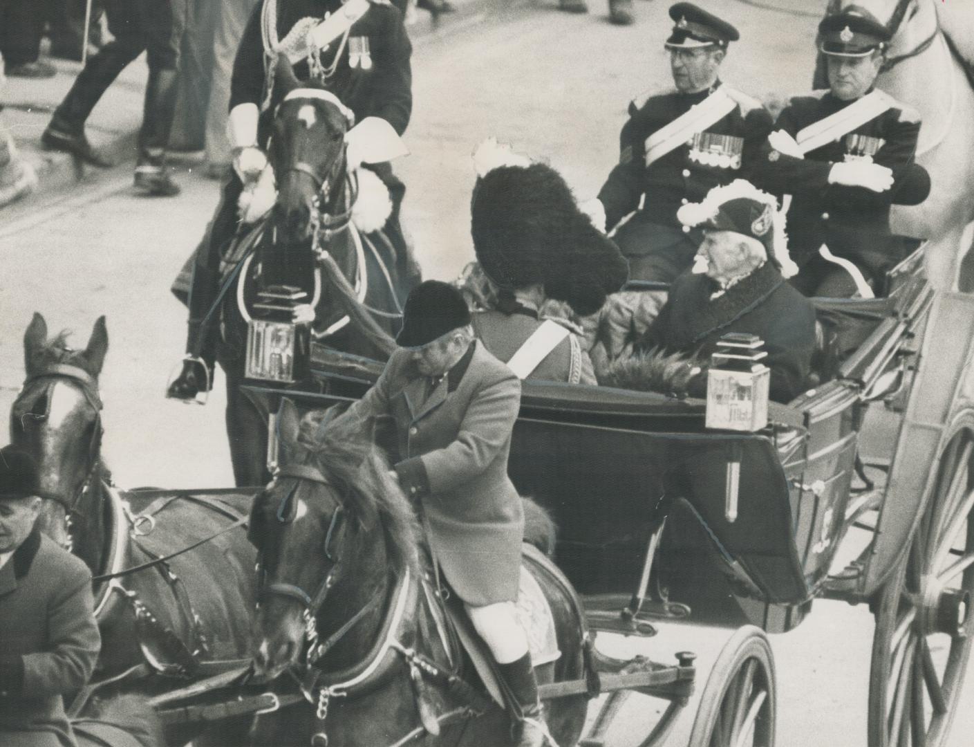 Resplendent in braided uniform and ostrich-plumed hat, Lieutenant-Governor W