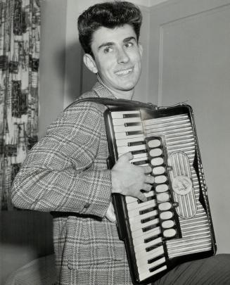 Accordion champ Joe Macerollo, 18, of Guelph, who recently won the Canadian accordion championship, is leaving for the world contest in Baden Baden, Germany, where there'll be 40 entrants from 25 nations