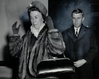 Mrs. Viola MacMillan leaves John Campbell's hearing. She loaned his wife 5,000 shares. I wasn't in habit of doing that.