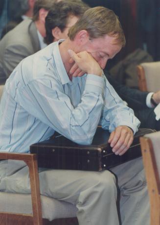 Last-minute reprieve: An anxious SkyDome president Charles Magwood listens as politicians debate approving the stadium's opening gata.