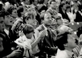 Triumphant moment: Dome chief Chuck Magwood beams, seated beside his wife and daughter.