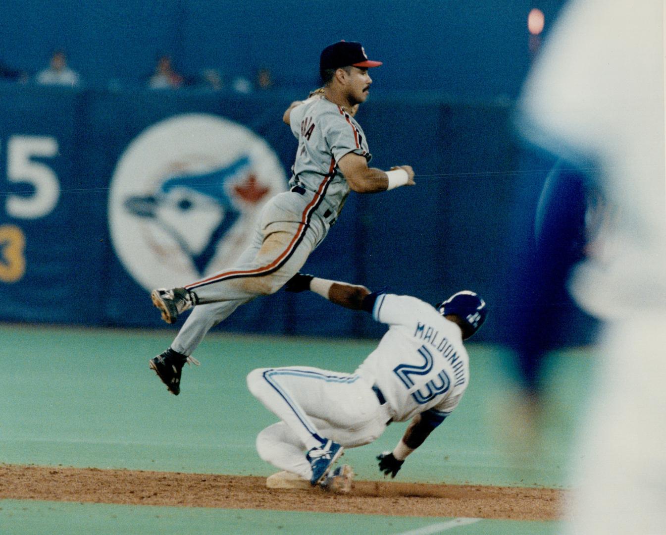 Jays have a blast: Candy Maldonado is forced at second by Carlos Baerga last night