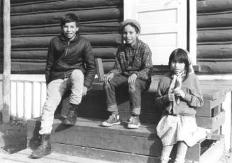 Children sitting on steps