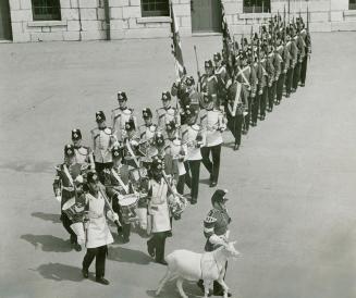 Fort Henry "Redcoats" on parade with goat mascot "David," a gift from Wales