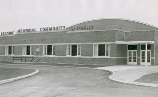 Image shows a one storey arena building.