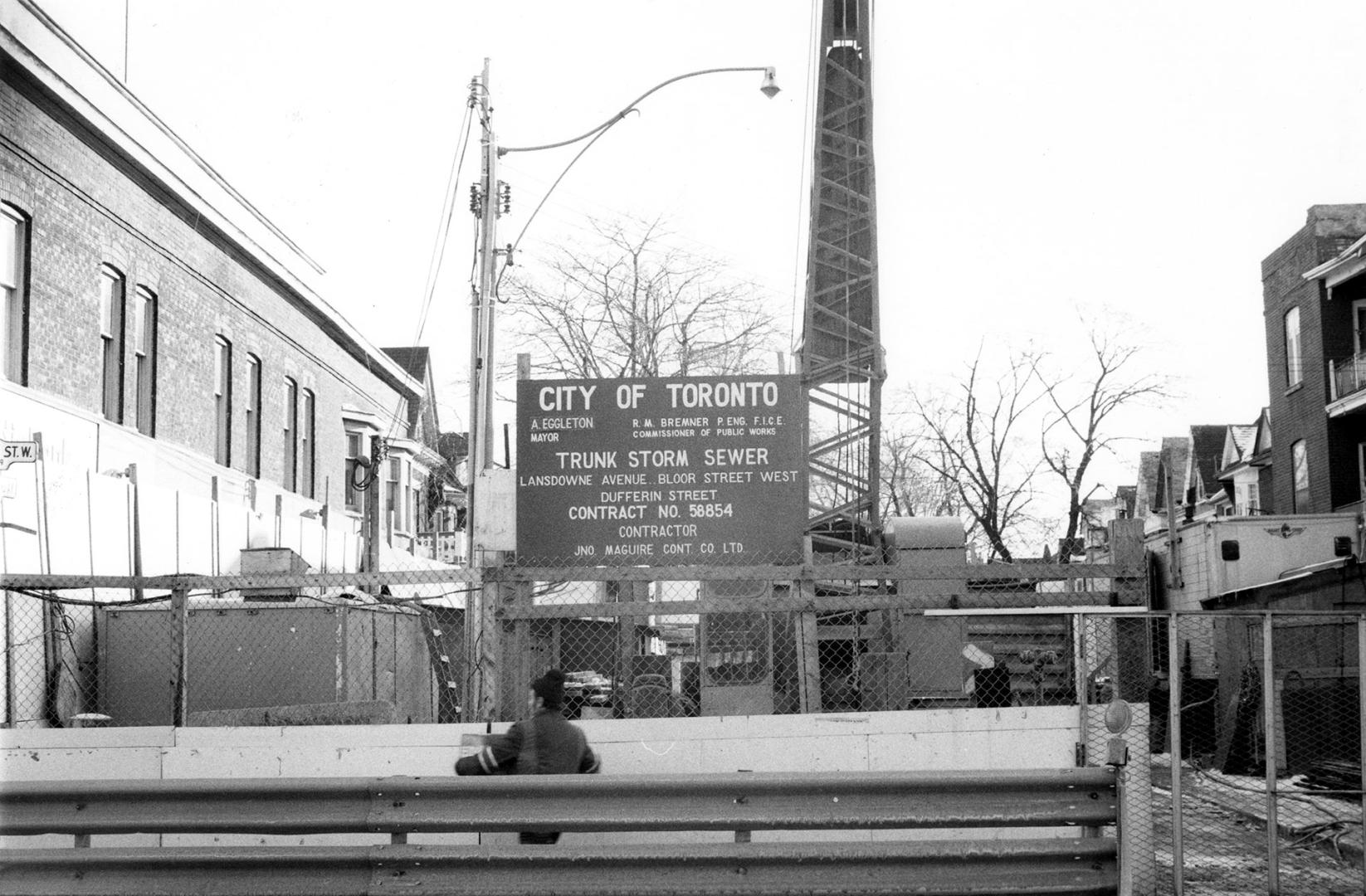 Storm sewer construction, Bloor Street West, south side, looking south down St. Clarens Avenue from Bloor Street West, Toronto, Ont.