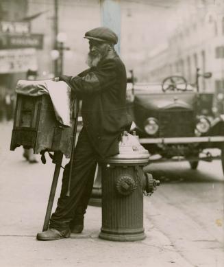 Organ Grinder, on Bay St., Toronto, Ontario