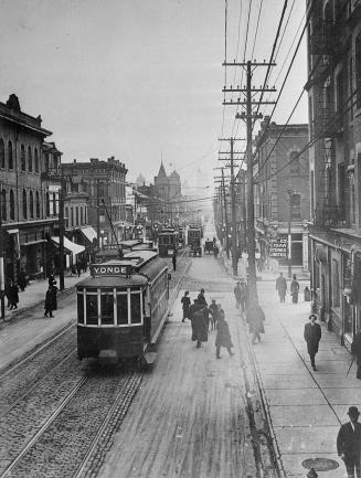 Yonge Street, (Queen to College Streets) looking south from north of College St