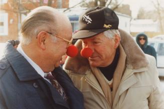 Acton Mayor Russ Miller, left, compares beaks with Jack Carpenter. Acton, Ontario