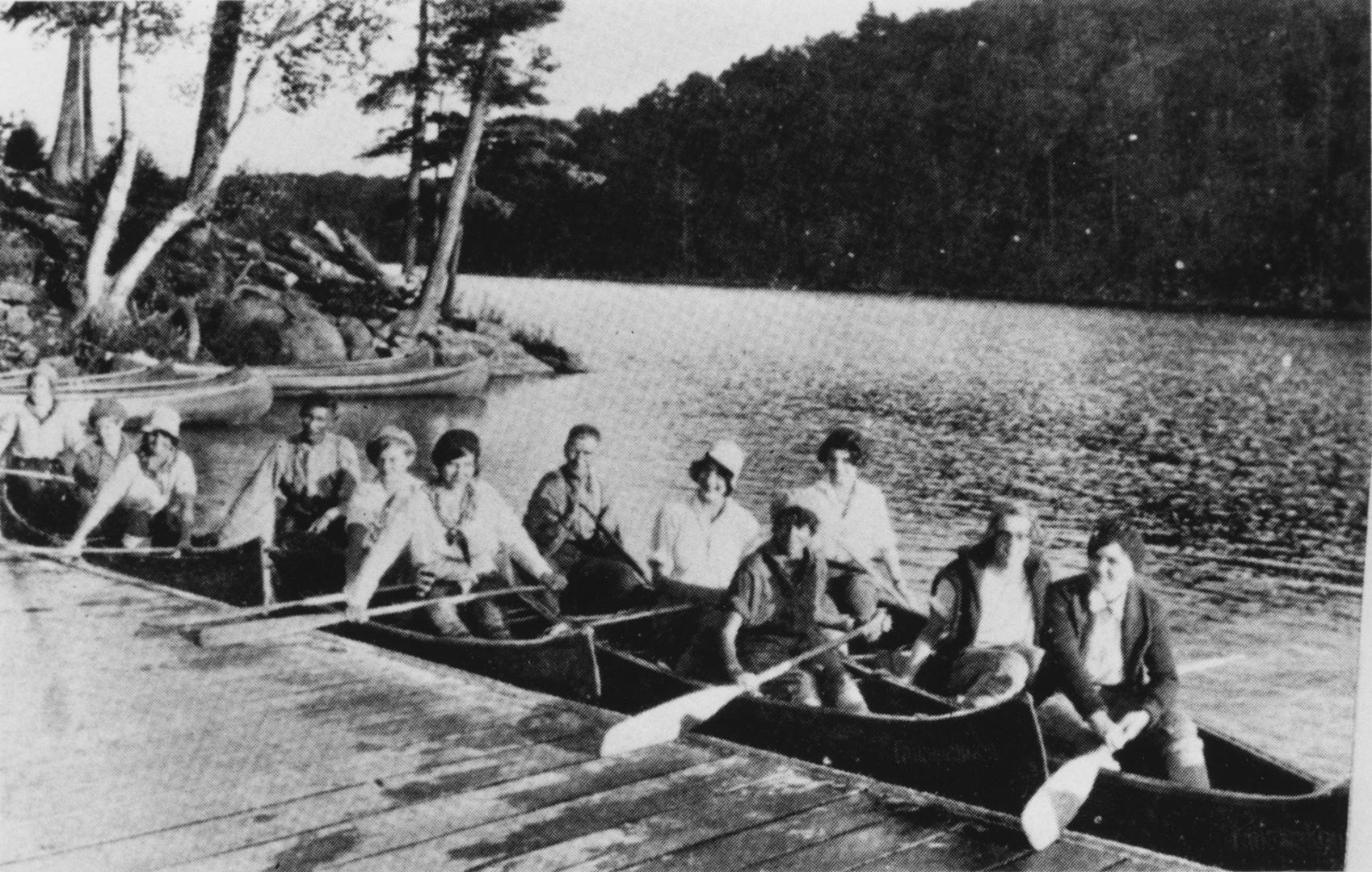 Narrowbug Lake, Camp Tanamakoon girls on canoe trip. Algonquin Provincial Park, Ontario