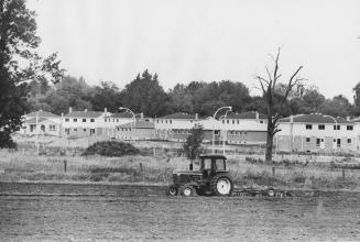 Tractor on a fertile farmland, Alliston, Ontario